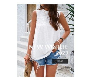 Close-up of white sleeveless blouse with dobby dot fabric and delicate lace details