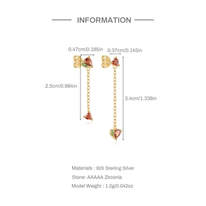 Detailed view of S925 sterling silver asymmetrical cherry earrings with red zircons