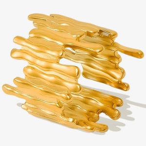 Detail of gold-plated 304 stainless steel ring with liquid lava texture and open design