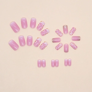 French gradient press-on nails with white daisy prints and silver glitter accents