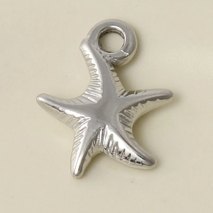 Detailed macro shot of 304 stainless steel starfish pendant with textured ocean design