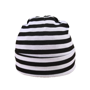 Soft cotton newborn beanie with black and white stripes for winter warmth
