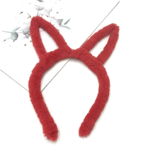 Detail view of red plush cat ear headband with soft fluffy texture for parties