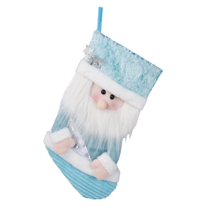 Chaussette de Noël en tricot bleu avec Père Noël 3D et paillettes sur fond blanc pur