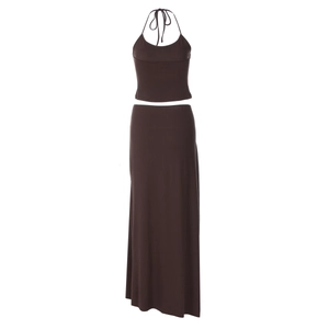 Detail view of deep brown halter crop top and high waist long skirt set for women