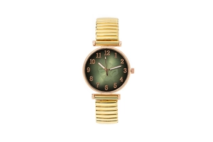 Detailed view of women's gold watch featuring green leaf gradient dial and elastic band