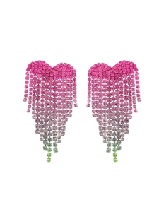 Macro detail of heart fringe earrings featuring pink purple and green gradient rhinestones