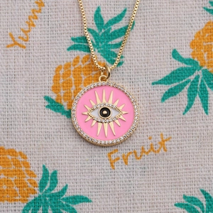 Pink evil eye pendant necklace in gold plated copper with sparkling zircon crystals
