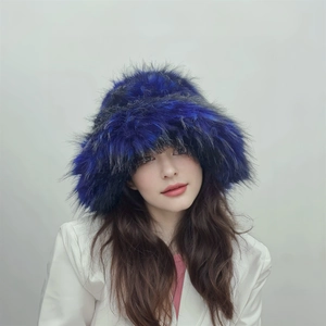 Close-up of fluffy faux fur texture in dark blue and black on an oversized punk style hat