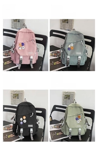 Four large capacity travel backpacks in pink, blue, black, and green colors display