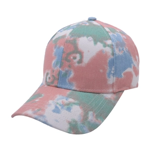 Detailed close-up of macaron tie-dye pattern on six-panel cotton baseball cap fabric