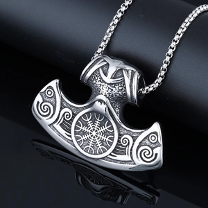 Detail view of Viking axe pendant with Aegishjalmur symbol on black mirror base