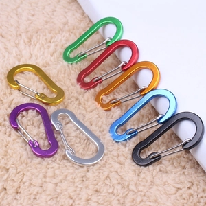 Group of colorful D-ring aluminum carabiners in green, red, gold, purple, and blue colors