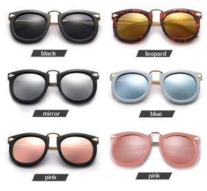 Set of retro cat eye sunglasses in various colors including black, leopard, and pink mirror