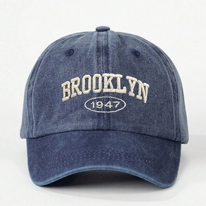 Vintage washed dark blue denim baseball cap with white Brooklyn 1947 embroidery detail