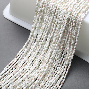 Macro view of 2mm faceted white AB glass beads strings for DIY jewelry making