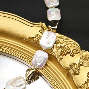 Baroque rectangle pearl necklace with gold metallic beads on vintage frame
