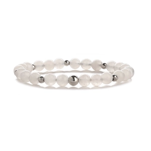 Detail of 6mm translucent frosted white beads and polished silver spacer beads on a bracelet