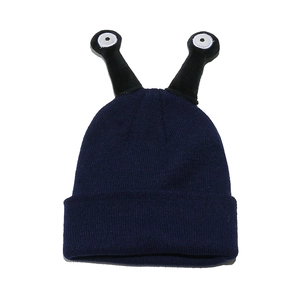 Funny dark blue knit beanie with cute alien tentacles and eyes for autumn and winter