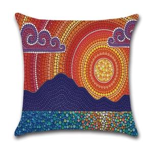 Detailed view of linen cushion cover featuring pointillism landscape and sunrise pattern