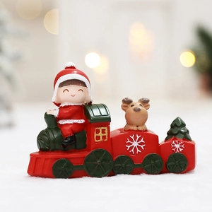 Christmas train resin ornament featuring a girl driver with reindeer and tree figurines