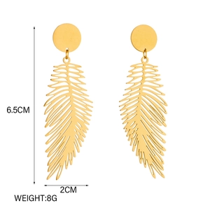 Golden long feather leaf drop earrings with detailed hollow veins on white background
