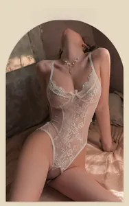 Detailed view of white floral lace lingerie bodysuit with delicate bow and thin straps