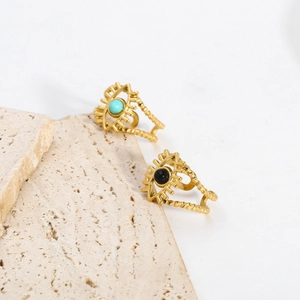 Gold plated stainless steel evil eye rings with turquoise beads on stone platform