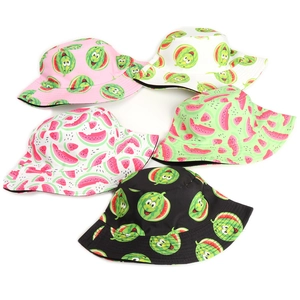 Flat lay of multiple cotton bucket hats featuring various colorful watermelon print patterns