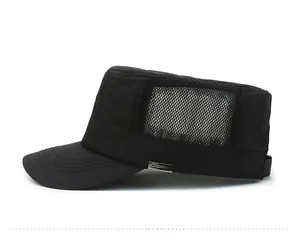 Detail view of breathable black mesh side panel and silver metal logo on flat top cap