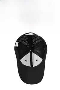 Detail view of quick-dry baseball cap interior with mesh vents and adjustable buckle