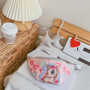 Close-up of pink sequin unicorn waist bag for girls on a cozy decorative background