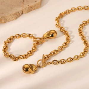 Titanium steel OT buckle necklace and bracelet set with streamlined pendants in gold