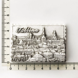 Macro view of Tallinn Estonia 3D resin fridge magnet with size scale and stamp edge