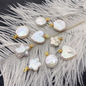 Natural freshwater pearl pendants in star and heart shapes with gold connector loops