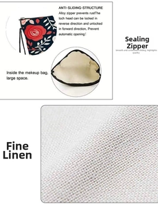 Detail view of floral linen makeup bag showing anti-slip alloy zipper and interior space