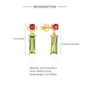 Detail of S925 sterling silver earring with red zircon and green rectangular stone