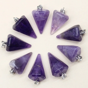 Macro view showing nine purple amethyst hexagonal cone pendants with silver metal loops