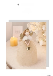 Detailed close-up of a Christmas angel doll with knitted hair and sparkly mesh skirt