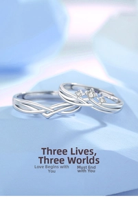 Macro shot of S925 sterling silver couple rings with intertwined bands and three stones