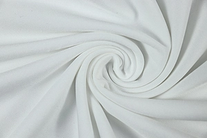 Close-up macro detail of the white knitted mesh fabric with breathable texture and soft feel