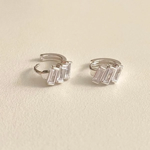 Minimalist S925 sterling silver hoop earrings featuring baguette-cut white zircon stones