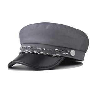 Gray vintage baker boy hat with black leather brim and decorative silver metal chain