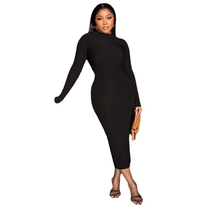 Slim fit black long sleeve maxi dress with side ruched detail and classic round neck
