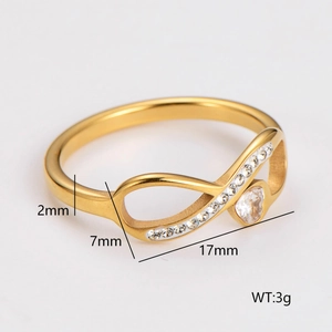 Gold infinity ring with heart-shaped zircon and pave crystals in stainless steel