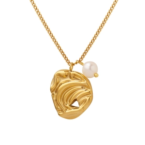Irregular gold titanium steel necklace with baroque freshwater pearl on white background