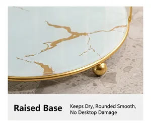 Detail of blue marble texture tray with gold metal frame and raised non-scratch round feet