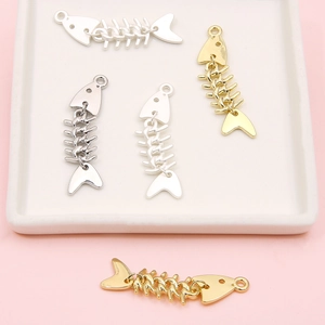 Creative movable alloy fishbone charms for DIY jewelry in gold and silver finishes