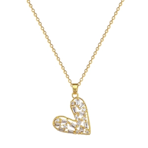 Luxurious gold titanium steel necklace featuring a hollow heart pendant with sparkling crystals