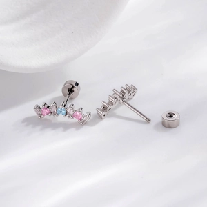 Curved silver studs with micro-pave crystals and colorful zircon heart accents